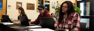 Students-signing-into-Orientation-16×6-LTC_7434w Three students registering for Orientation