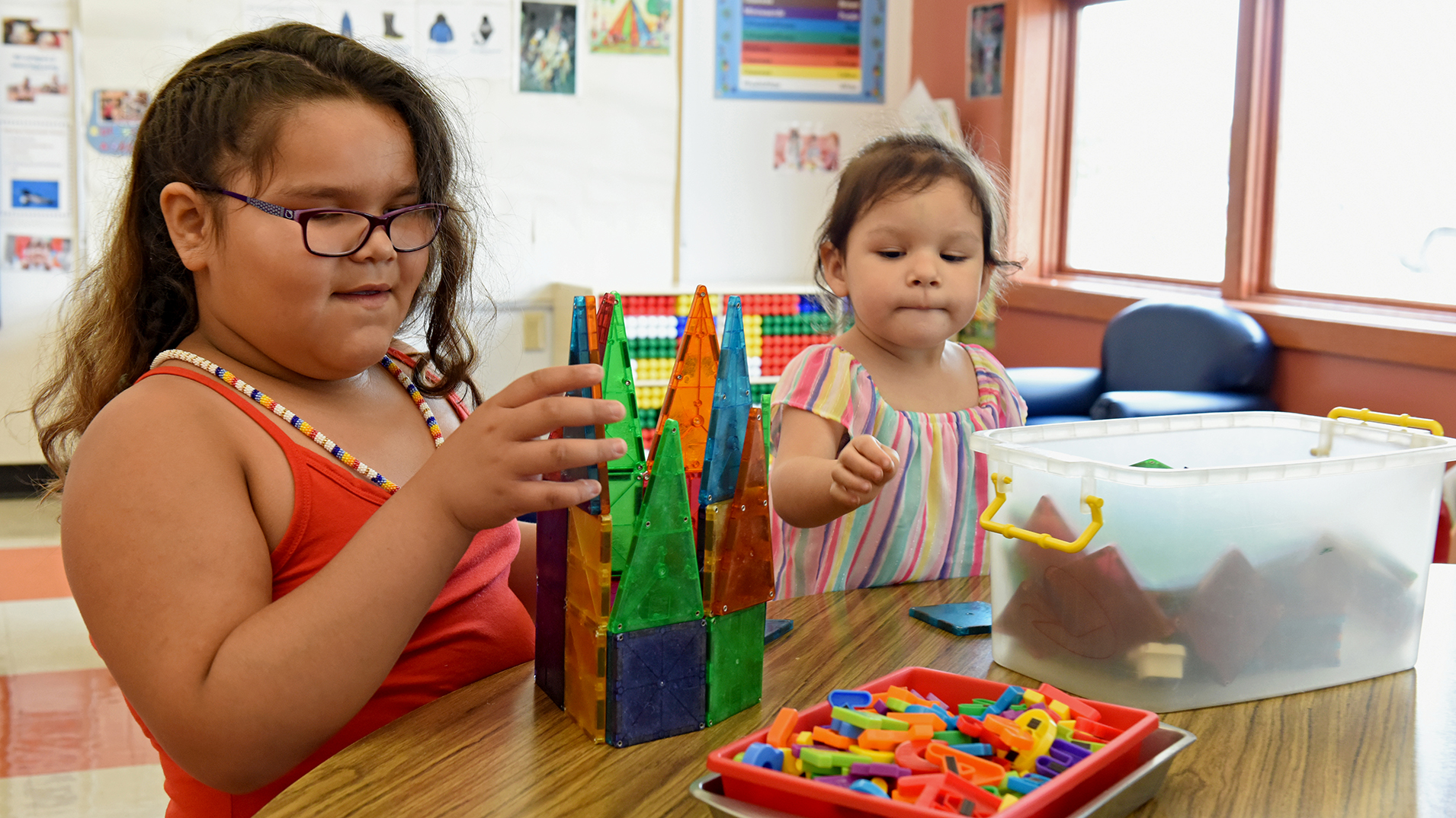 Early Education children playing at the table