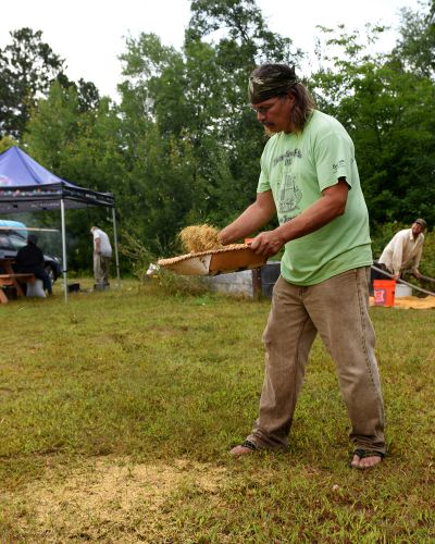 Winnowing Rice